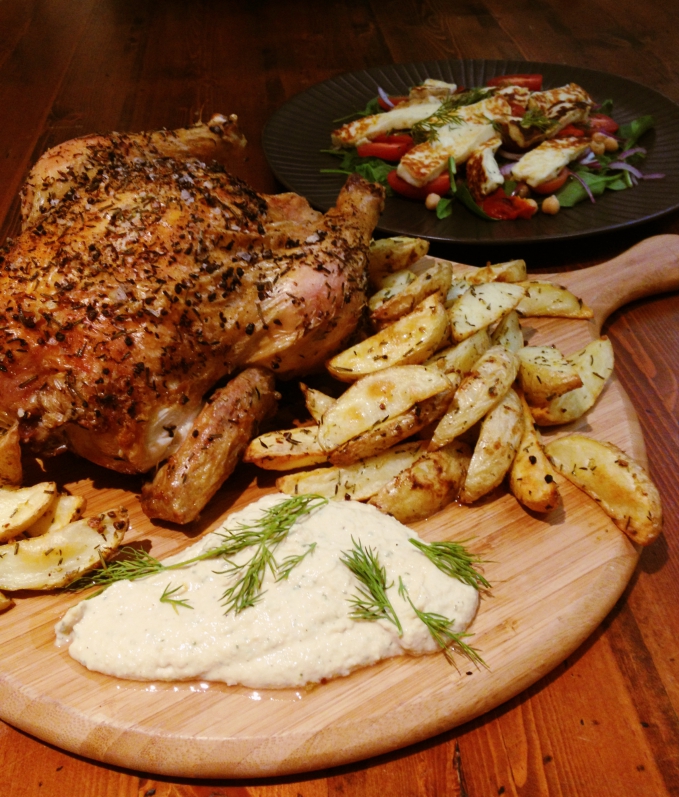 Herb roasted Chicken with Haloumi salad and Hummus